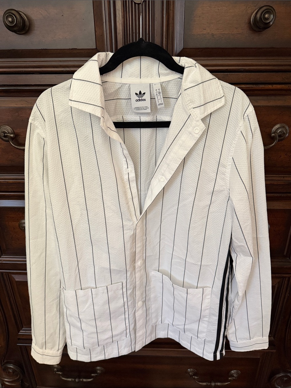 Adidas White Jacket with Black Pinstripes, pockets, snap closure